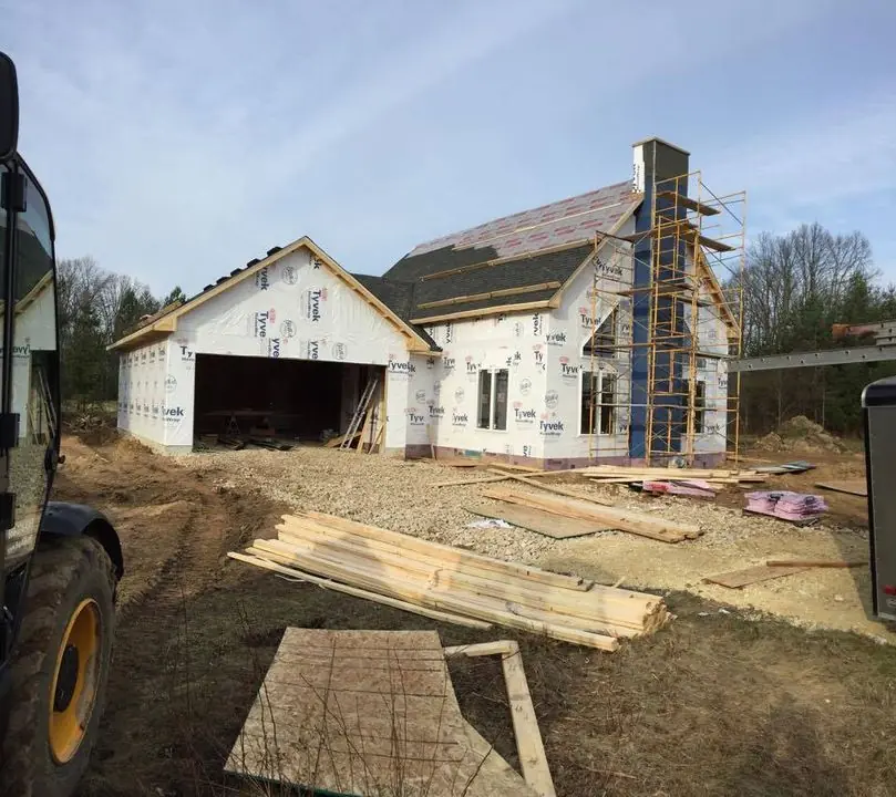 New home and garage with chimney chase framing