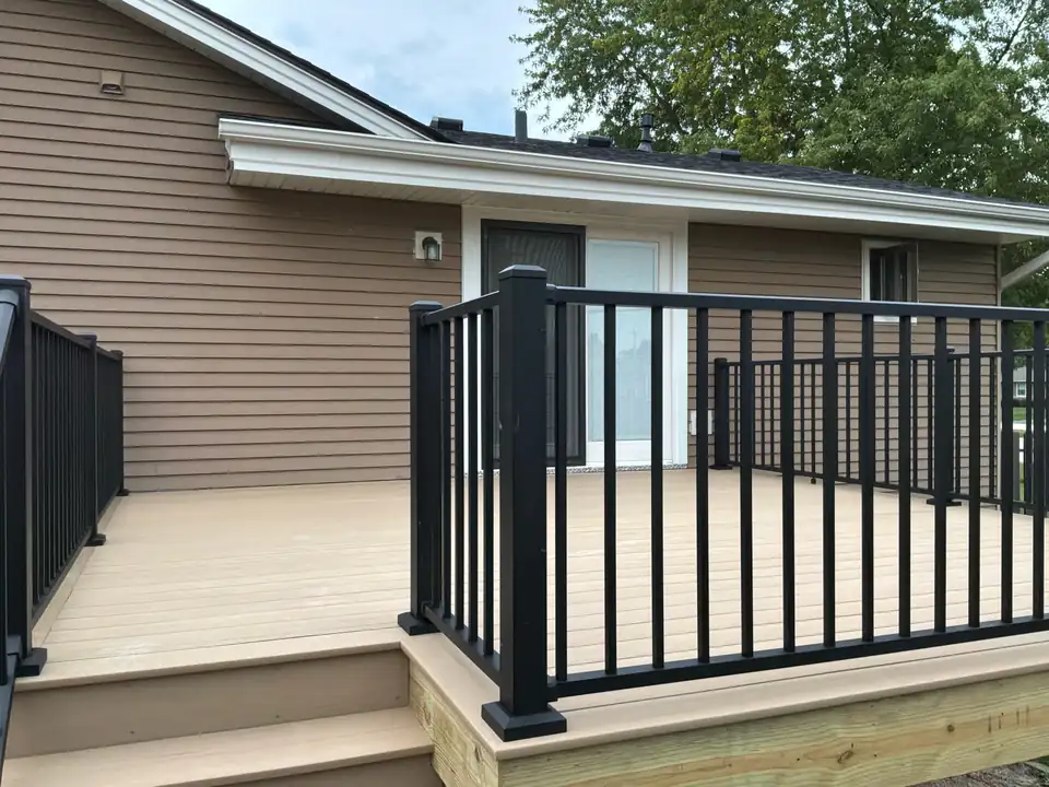 Composite deck with black aluminum railings