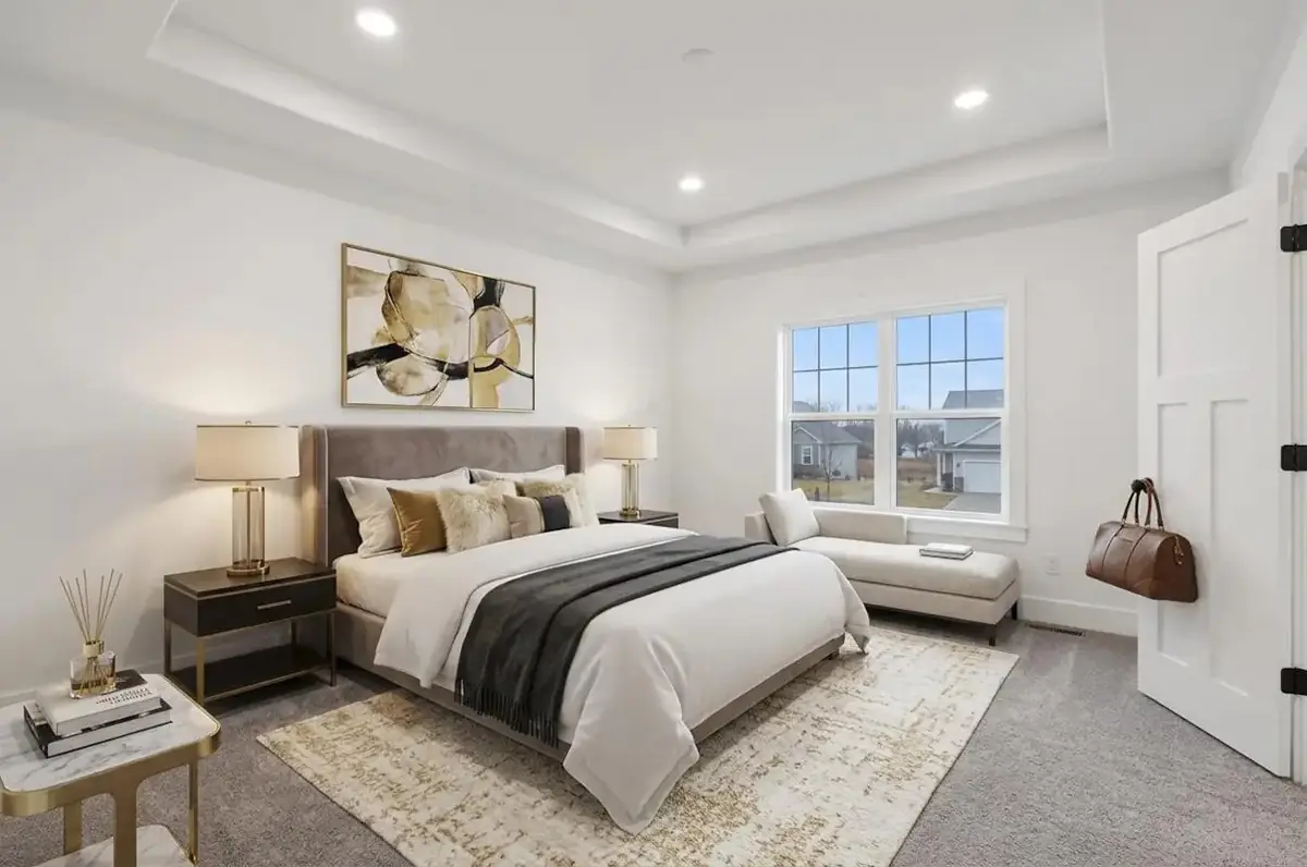 Stepped tray ceiling in a primary bedroom