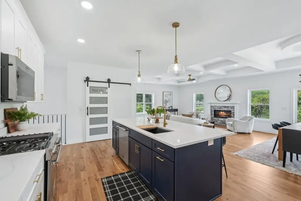 Coffered ceiling running from kitchen to living room