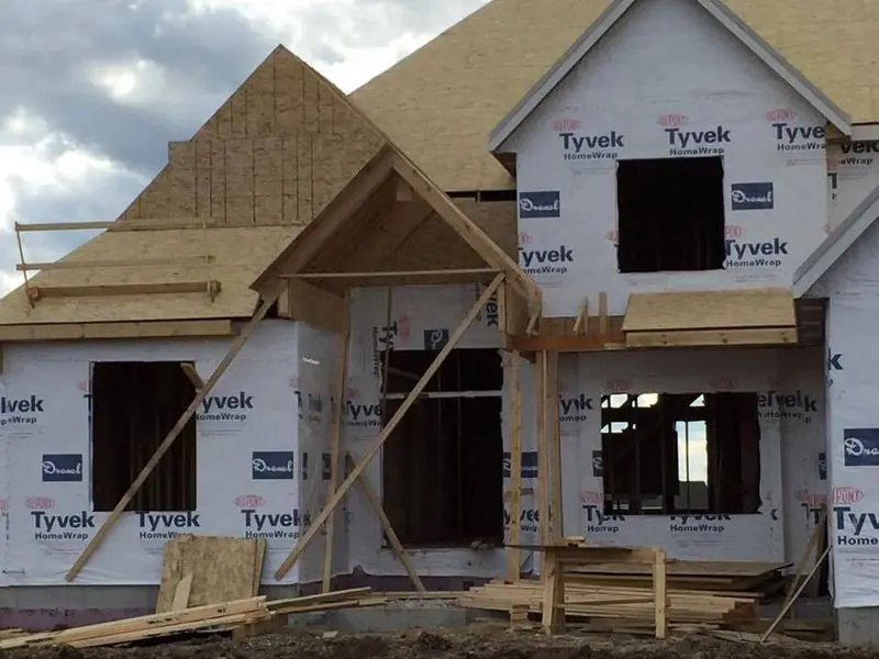 Two-story new home framed and wrapped